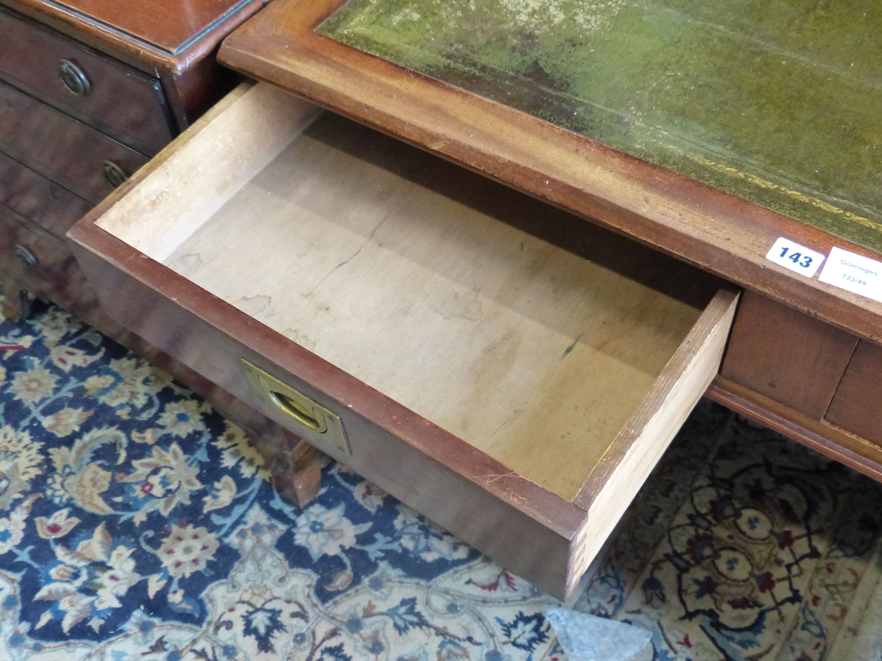 A small mahogany military style pedestal desk, length 99cm, width 42cm, height 73cm